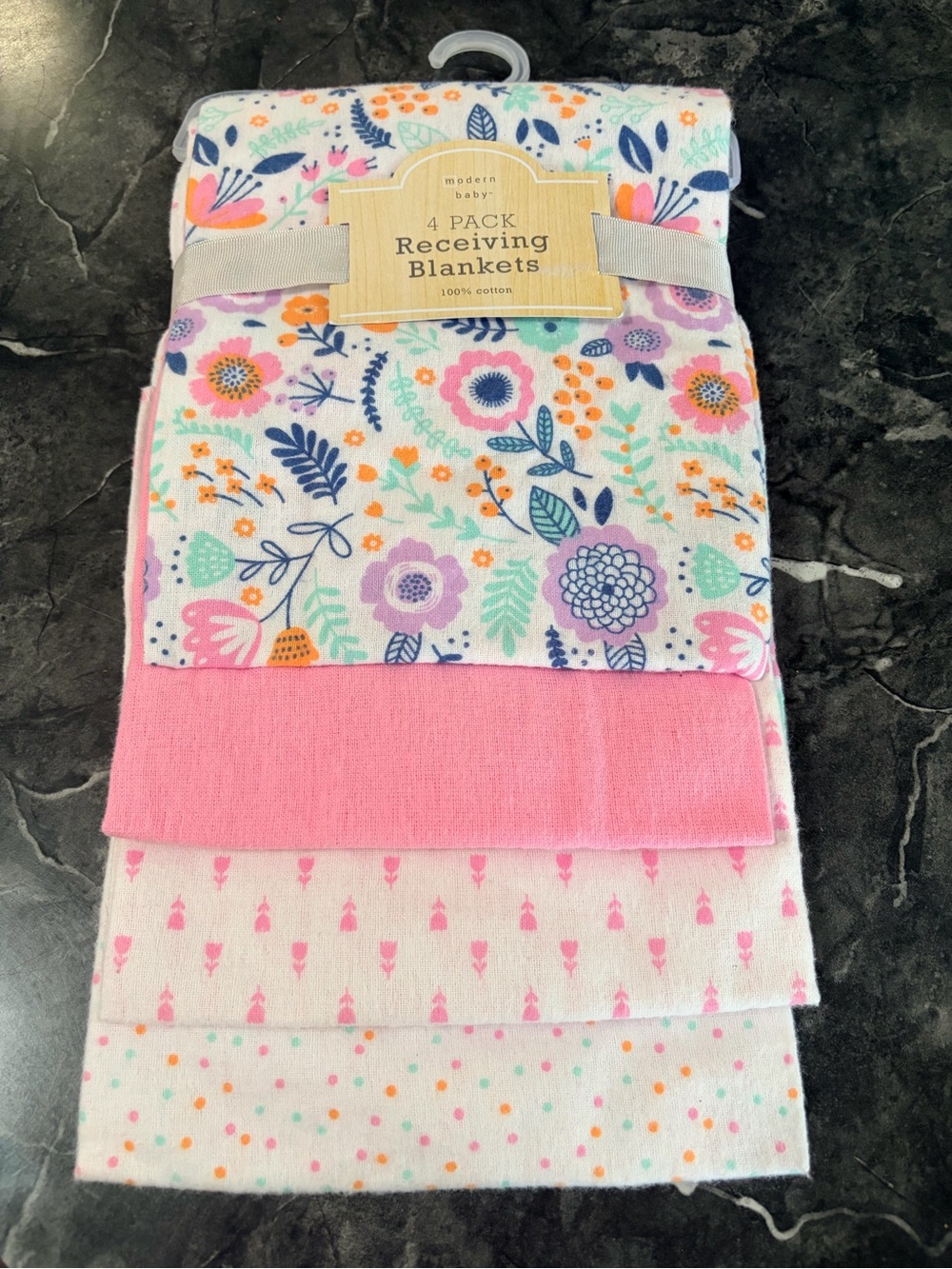 Baby girl receiving blankets